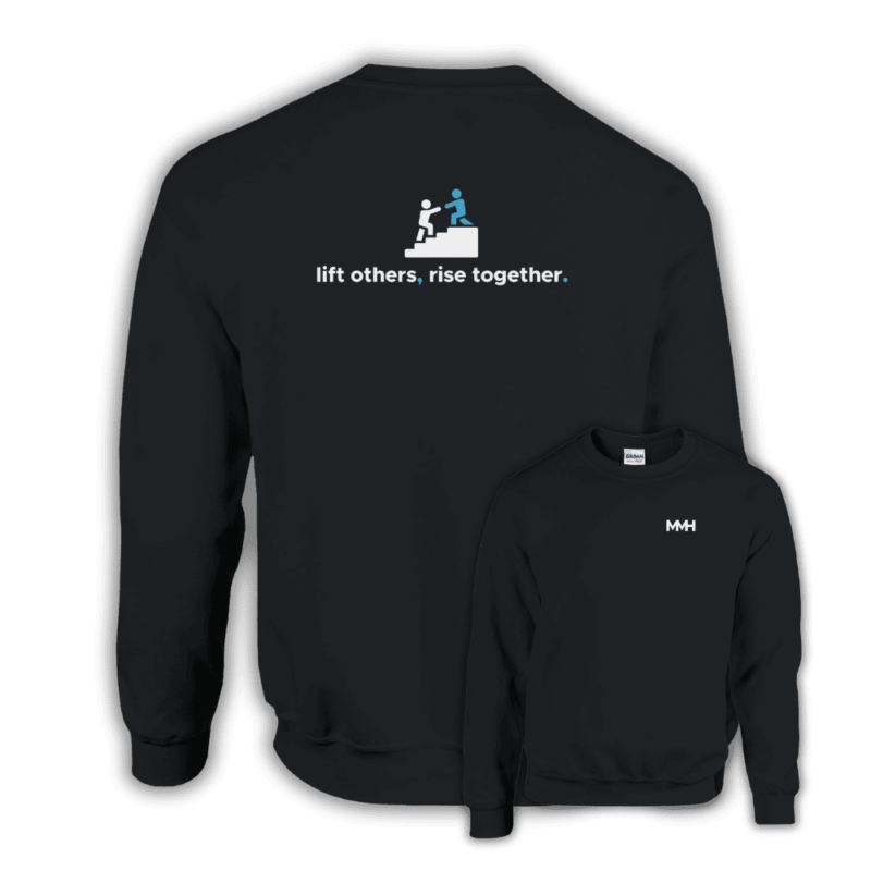 Black sweatshirt with an icon of one person helping another climb stairs and the phrase “lift others, rise together.” across the back. Features MMH logo on the front.